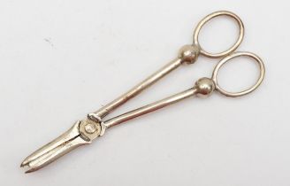 A silver pair of grape scissors, Sheffield 1932, crested, missing front cover, 14cm, 62gm