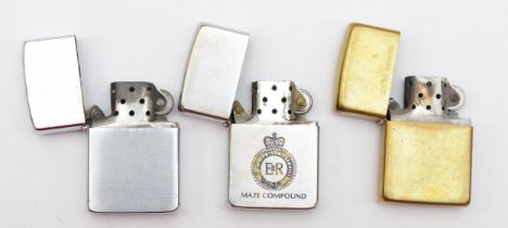 Zippo, three petrol lighters, ERII Maze Compound, Brass, dated 1989 and chrome.