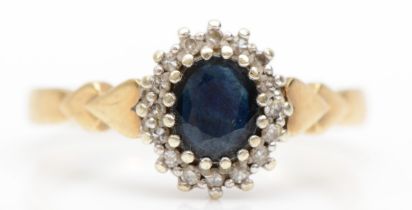 A 9ct gold sapphire and diamond cluster ring, with heart shaped shoulders, O, 3gm.