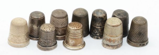 A Victorian silver thimble, by Charles Horner, Chester 1899 another 1901 and eight other silver/