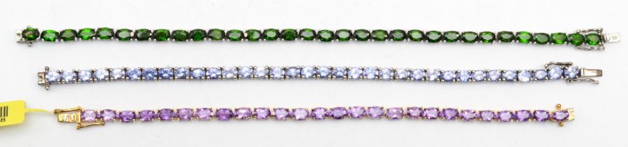 Three silver gem set tennis bracelets to include amethyst, 18cm, 30gm.