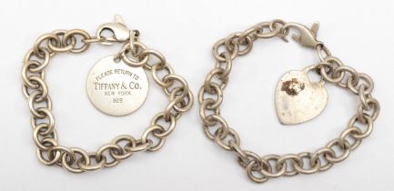 Tiffany & Co, a silver identity bracelet with heart shaped tag, 19cm, together with another