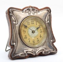 An Art Nouveau silver fronted easel clock, Birmingham 1906, oak case, 13 x 13.5cm, ticks for a