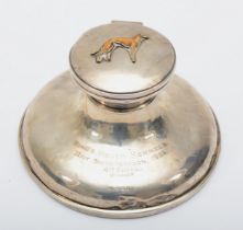 Of greyhound interest; a large silver capstan presentation inkwell, Birmingham 1932, with applied