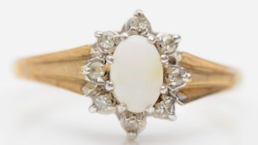 A 9ct gold opal and eight cut diamond cluster ring N-O, 1.7gm.