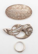 Ola Gorie, two Scottish silver brooches to include a floral example, 48 x 23mm, together with a