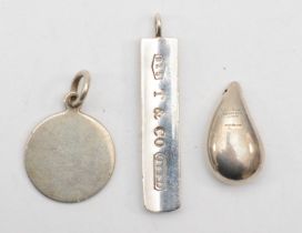 Tiffany & Co, three silver pendants, longest 41mm, 21gm.