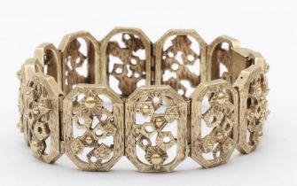 A silver floral and geometric shaped paneled bracelet, by D Shackman & Sons, London 1973, 18.5cm.