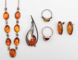 A group of silver Baltic amber jewellery to include a segmented necklace, 49cm, 43gm.