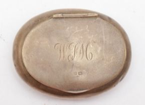 An oval silver tobacco case, Birmingham 1919, monogram, 8 x 6 x 2cm, 54gm