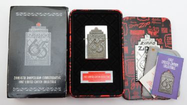 Zippo, a collectors petrol lighter, Anniversary 1932 - 1007, unused, with paperwork, pouch, booklet,