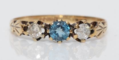 A 9ct gold topaz the brilliant cut diamond dress ring, L, 1gm.
