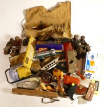 A collection of carpenters hand tools, to include drills, planes, chizels and other tools in three