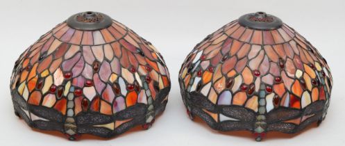 A pair of 20th century Tiffany style leaded glass lightshades, with floral and dragonfly decoration,