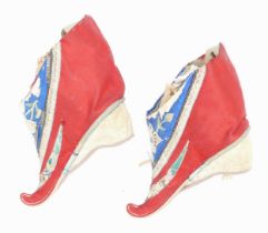 A pair of 20th century embroidered Chinese silk shoes/slippers, 10cm long