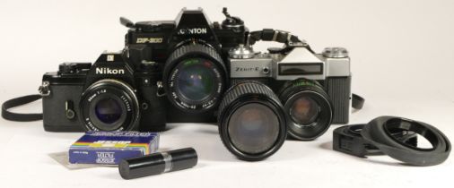 Three 35mm cameras and accessories, to include a Nikon EM, a Centon DF-300, a Zenit-E, cased with