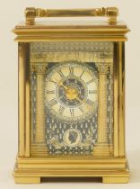 A boxed limited edition Halcyon Days enamel and brass cased limited edition mantle clock, 10cm high,