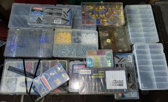 A large group of unused and used boxes of hardware to include nuts and bolts, washers, grub screws.