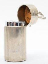 Gucci, a chrome gas table lighter, in the form of an ice bucket, 9.5cm