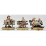 Three 20th century painted porcelain Capodimonte figures, Tramp feeding a squirrel together with a