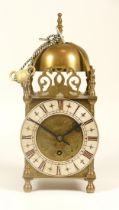 A 20th century brass cased lantern clock, 26cm high.