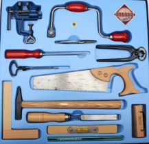 A mid 20th century child's tool set, replicas of full size versions, boxed.