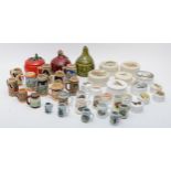An assortment of decorative ceramics comprising fifteen Gentlemen Relish lidded pots, twenty two
