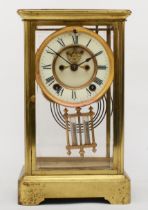 An early 20th century Ansonia of New York brass cased and four glass mantle clock, 27cm high.