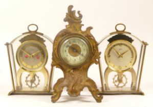 A 20th century German gilt metal cased cartouche shaped mantle clock, 17cm high, together with two