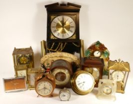 A collection of mid 20th century and later mantel clocks, having manual wind and quartz movements,