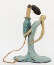 A 20th century cold painted pewter figural table lamp, cast in the form a lady holding a vase,