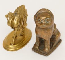 A 20th century gilt brass model of a standing camel raised on oval plinth, 8cm high together with