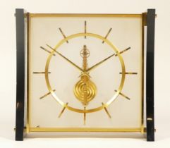 A 20th century Jaeger leCoultre brass black Perspex cased mantle clock, impressed 435 4047 to one