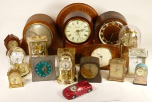 A collection of mid 20th century and later mantel clocks, having manual wind and quartz movements,