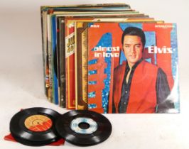Assorted mid 20th century and later vinyl LPs and singles, to include David Bowie, Elvis Presley,