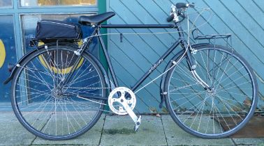 A gentlemen's black road bicycle, each tyre 66cm diameter.