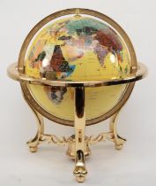 A large terrestrial world globe on gimbal cast brass frame, set with semi precious stones and
