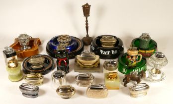 A collection of mid 20th century and later table cigarette lighters, petrol and gas filled, makers
