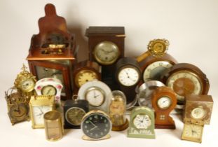 A collection of mid 20th century and later mantel clocks, having manual wind and quartz movements,