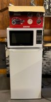 A freestanding larder fridge, 83x50cm together with a Kenwood microwave and a Hoover Whirlwind