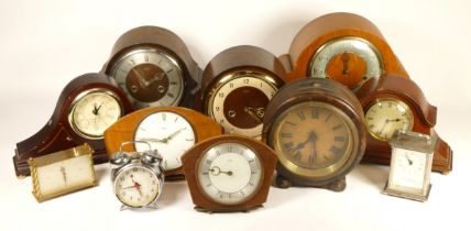 A collection of mid 20th century and later mantel clocks, having manual wind and quartz movements,