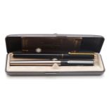 Mont Blanc, a black plunger fill fountain pen with gold plated nib and a Mont Blanc BEHR plunger