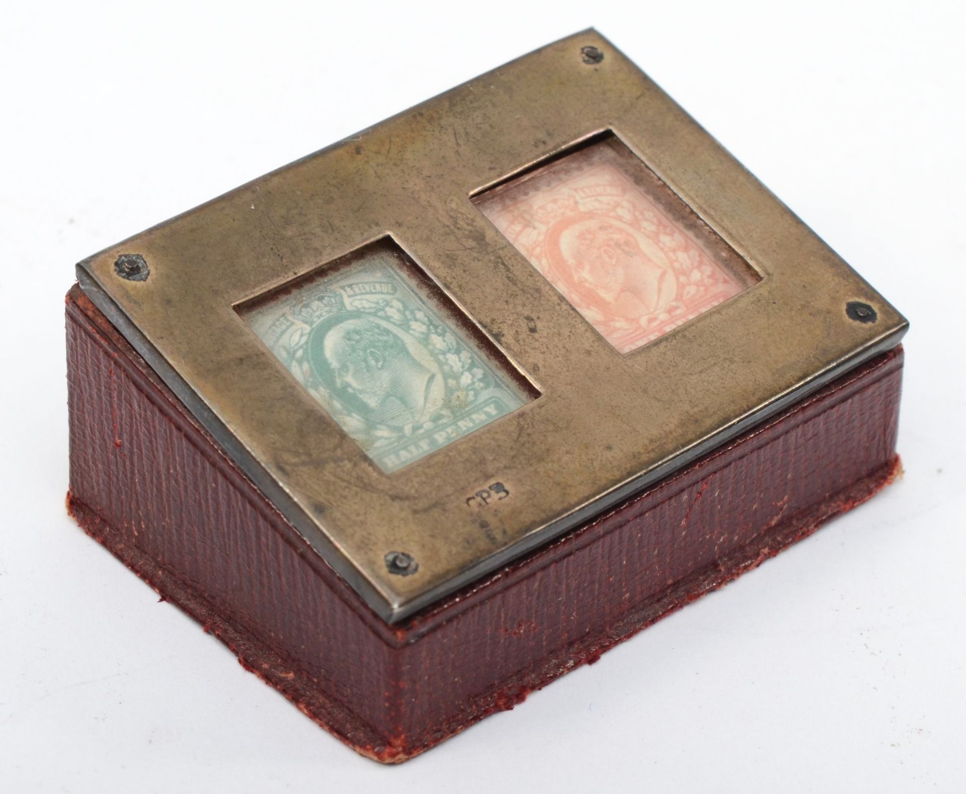 An Edwardian silver and leather stamp holder/box, hallmarks rubbed, 7 x 3 x 5cm.