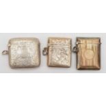 Three silver vesta cases to include an Edward VII silver vesta, Birmingham 1910, 50gm.