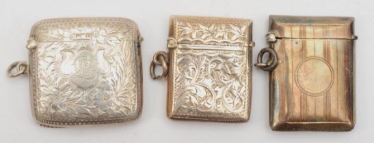 Three silver vesta cases to include an Edward VII silver vesta, Birmingham 1910, 50gm.