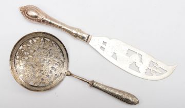 An early 20th century Iranian silver server, with pierced floral decoration, stamped control