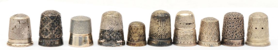 Ten various silver thimbles to include a Henry Griffith & Sons Ltd example, Chester 1913, 44gm.