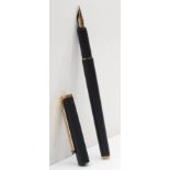 Mont Blanc, a cartridge fountain pen with gold plated nib.