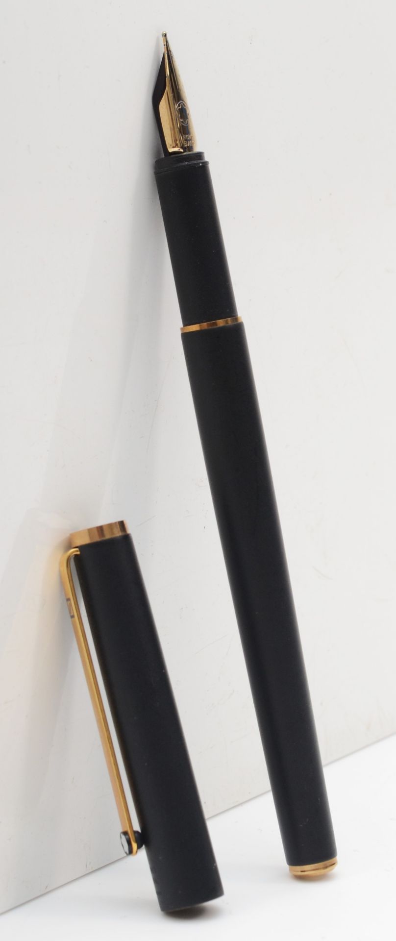 Mont Blanc, a cartridge fountain pen with gold plated nib.