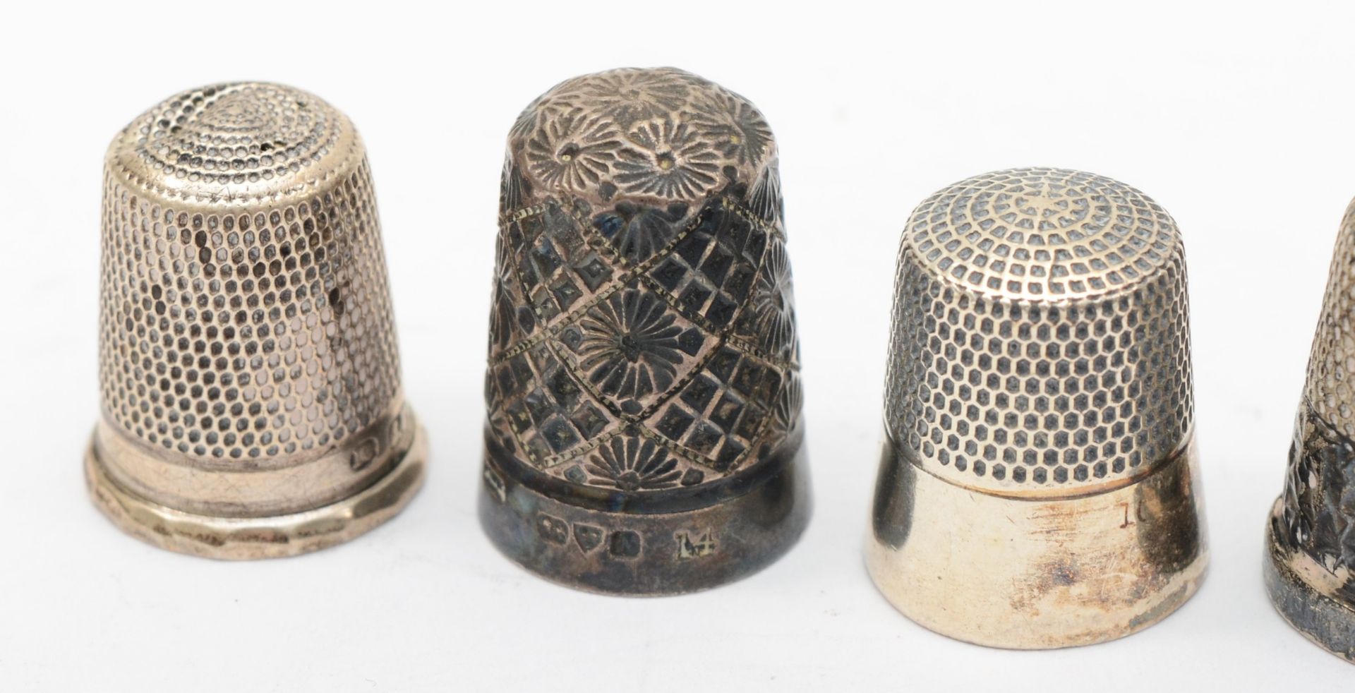 Ten various silver thimbles to include a Henry Griffith & Sons Ltd example, Chester 1913, 44gm. - Image 2 of 2